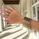 Thin Gold 6 Stack Bangle Bracelet Set

This bracelet stack features a gold leaf finish over flexible designer-grade resin for a sleek, modern look. Perfect for stacking or wearing solo to elevate any outfit.

Yellow Gold Plated
1.36" Long