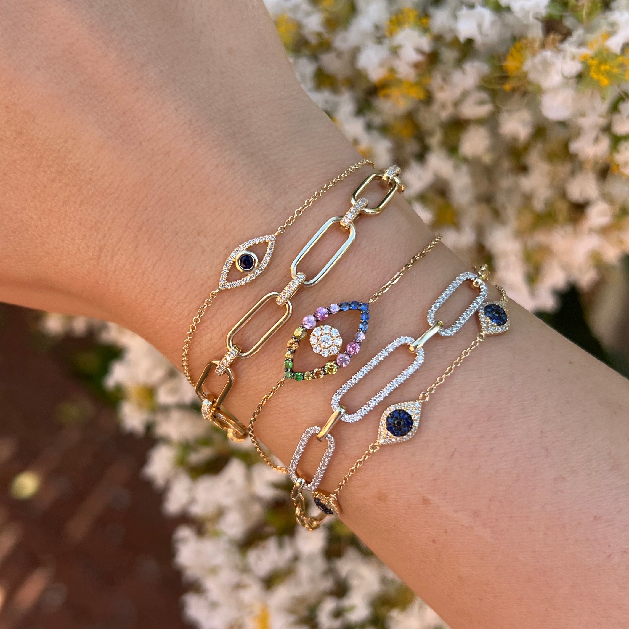 14K Gold Diamond &amp; Sapphire Five Eye Bracelet

14K Yellow Gold
0.22 Diamond Carat Weight
0.28 Sapphire Carat Weight
6-7" Adjustable Length