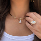 Crystal Pear Drop Choker Necklace

Yellow Gold Plated
Cubic Zirconia
Removable Charm: 1.05" Long X 0.40" Wide