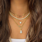 Pear Drop Fob Clasp Chain Necklace

Yellow Gold Plated
Cubic Zirconia
Removable Charm: 1.05" Long X 0.40" Wide