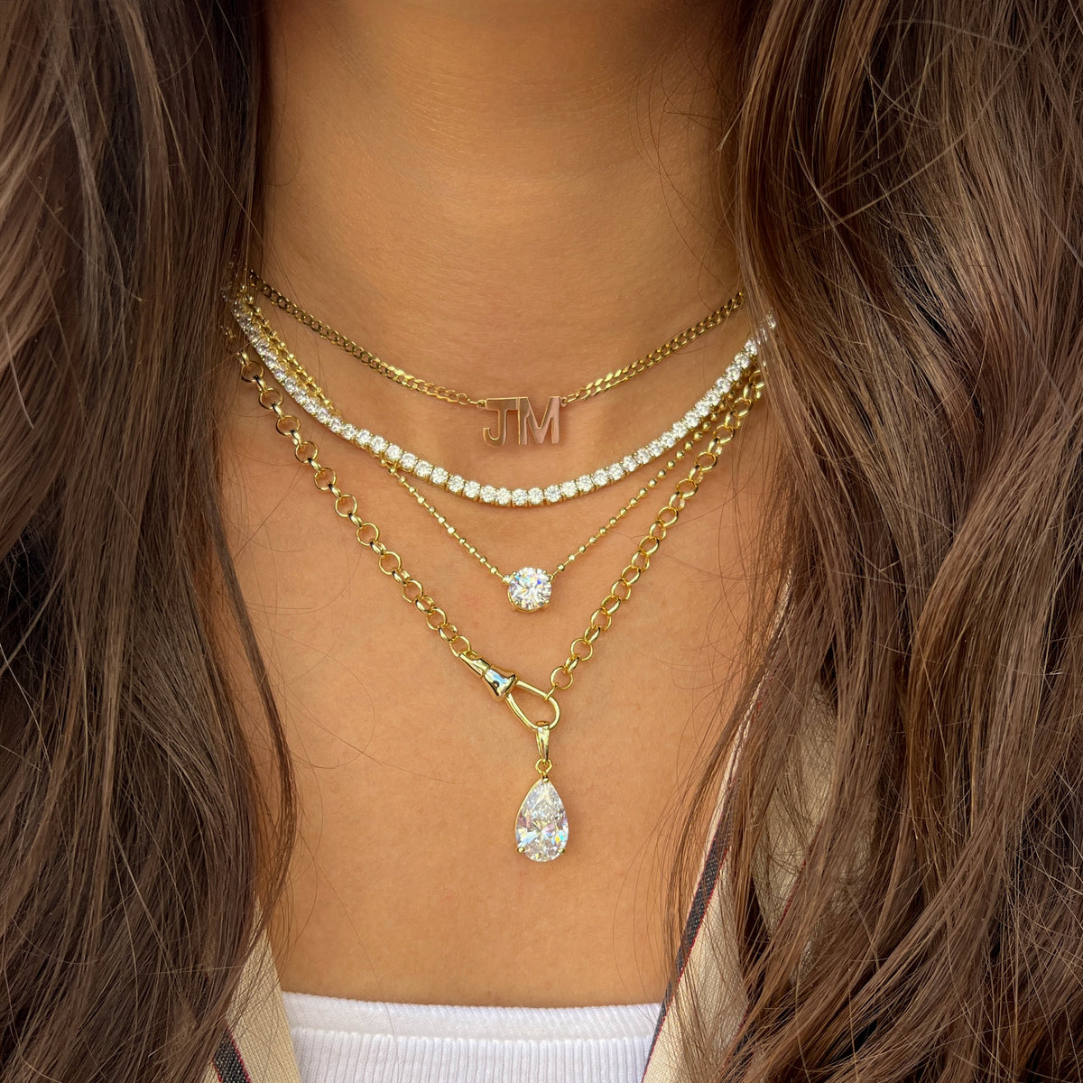 Pear Drop Fob Clasp Chain Necklace

Yellow Gold Plated
Cubic Zirconia
Removable Charm: 1.05" Long X 0.40" Wide