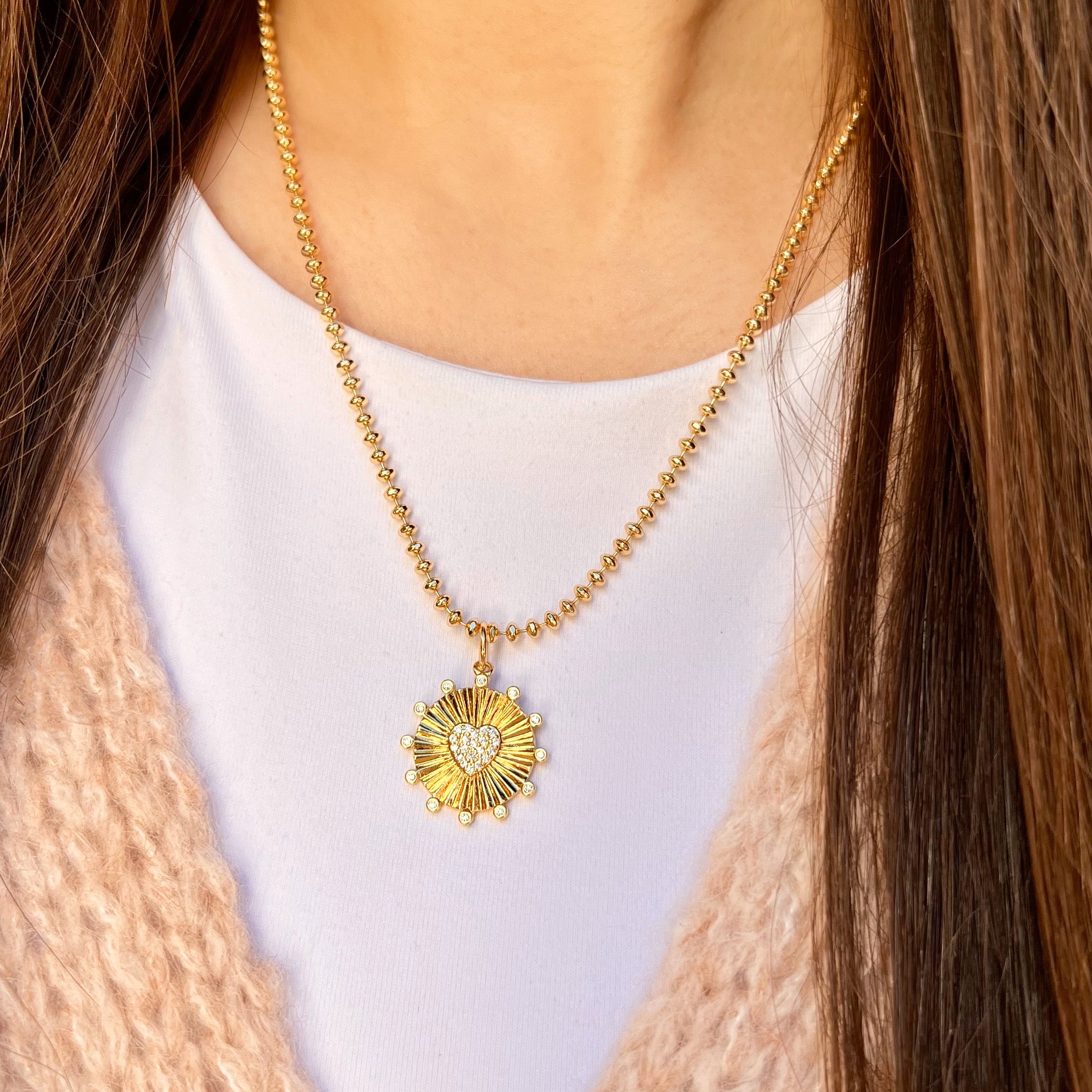 CZ Heart Disc Necklace  Yellow Gold Plated Heart Pendant: 0.77" Wide 18-20" Adjustable Length     While supplies last, all sales are final.