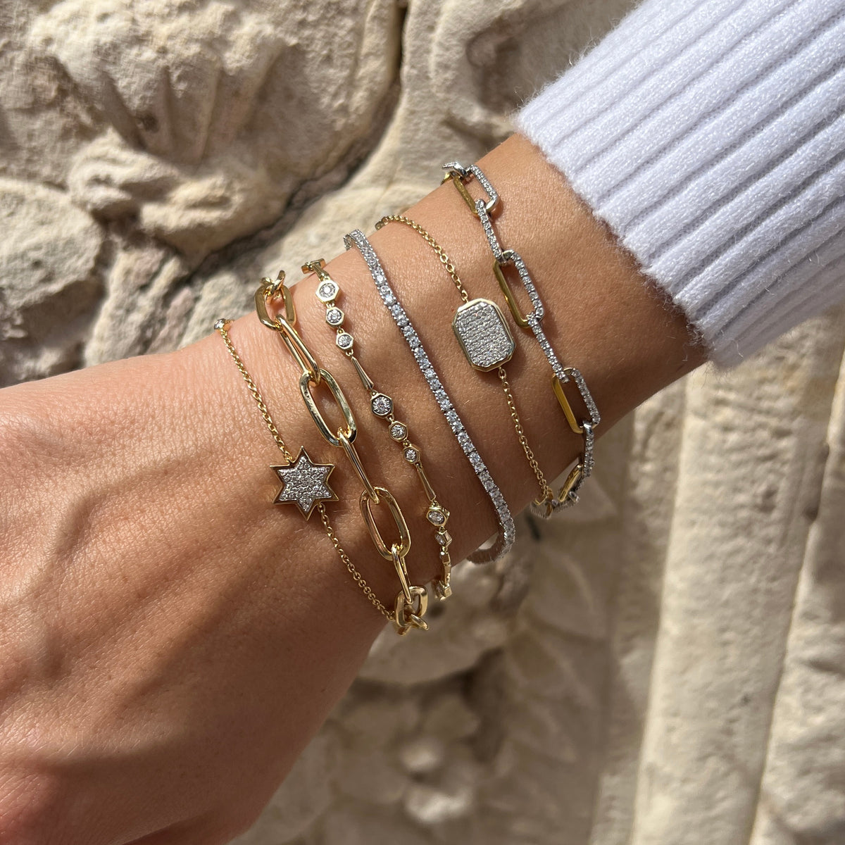14K Gold Diamond Star Of David Bezel Bracelet

14K Yellow Gold
0.15 Diamond Carat Weight

6-7" Adjustable Length
Star: 0.45" Long X 0.50" Wide
Bezel: 0.10" Width