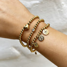 CZ Bezel Beaded Bracelet  Yellow Gold Plated CZ Bezel: 0.23" Wide 4MM Ball Beads 6.75-8" Adjustable Length  While supplies last. All Deals Of The Day sales are FINAL SALE.