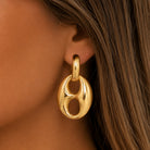 Mariner Link Drop Hoop Earrings

Elevate your everyday style with these statement earrings. Featuring a chic gold-plated hoop and an oversized mariner link drop, this contemporary design balances bold proportions with smooth, sculptural curves. Effortlessly versatile, they bring a touch of sophistication to everything from casual daytime outfits to evening ensembles.

Yellow Gold Plated

1.6" Long 0.9" Wide