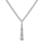 Tennis Lariat Necklace

White Gold Plated Over Silver
Cubic Zirconia
Drop: 1.84" Long X 0.35" Wide
16" Long