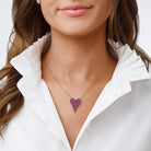 Pink CZ &amp; White CZ Reversible Heart Chain Necklace

Yellow Gold Plated
Heart approximately 1" High X 0.75" Wide&nbsp;
16.5-20.5" Adjustable Length
Double-sided