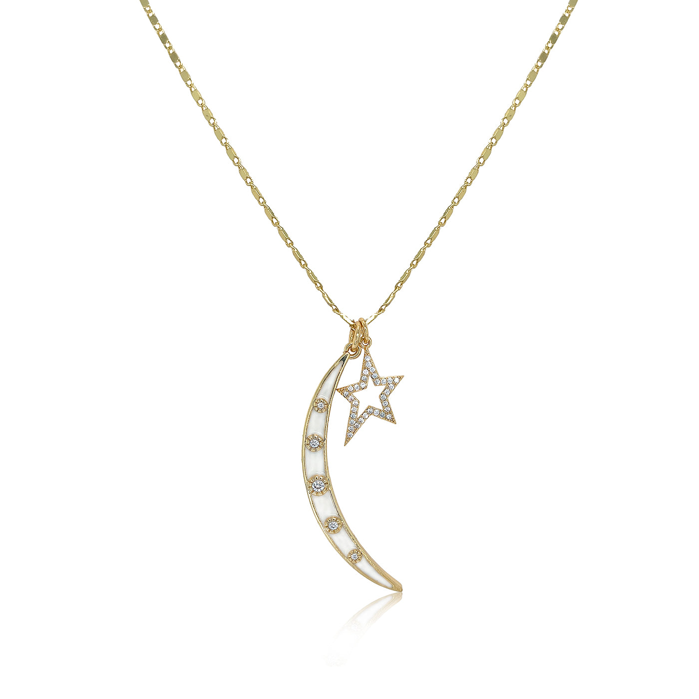 Enamel Moon &amp; Star Charm Necklace

Add a touch of celestial charm with our Moon &amp; Star Charm Necklace. Featuring enamel moons and stars, this playful necklace is sure to make a statement. Perfect for everyday wear or a night out under the stars.

Yellow Gold Plated
Moon: 2" Long X 0.25" Wide
Star: 0.75" Long X 0.5" Wide
17-19" Adjustable Length
Cubic Zirconia