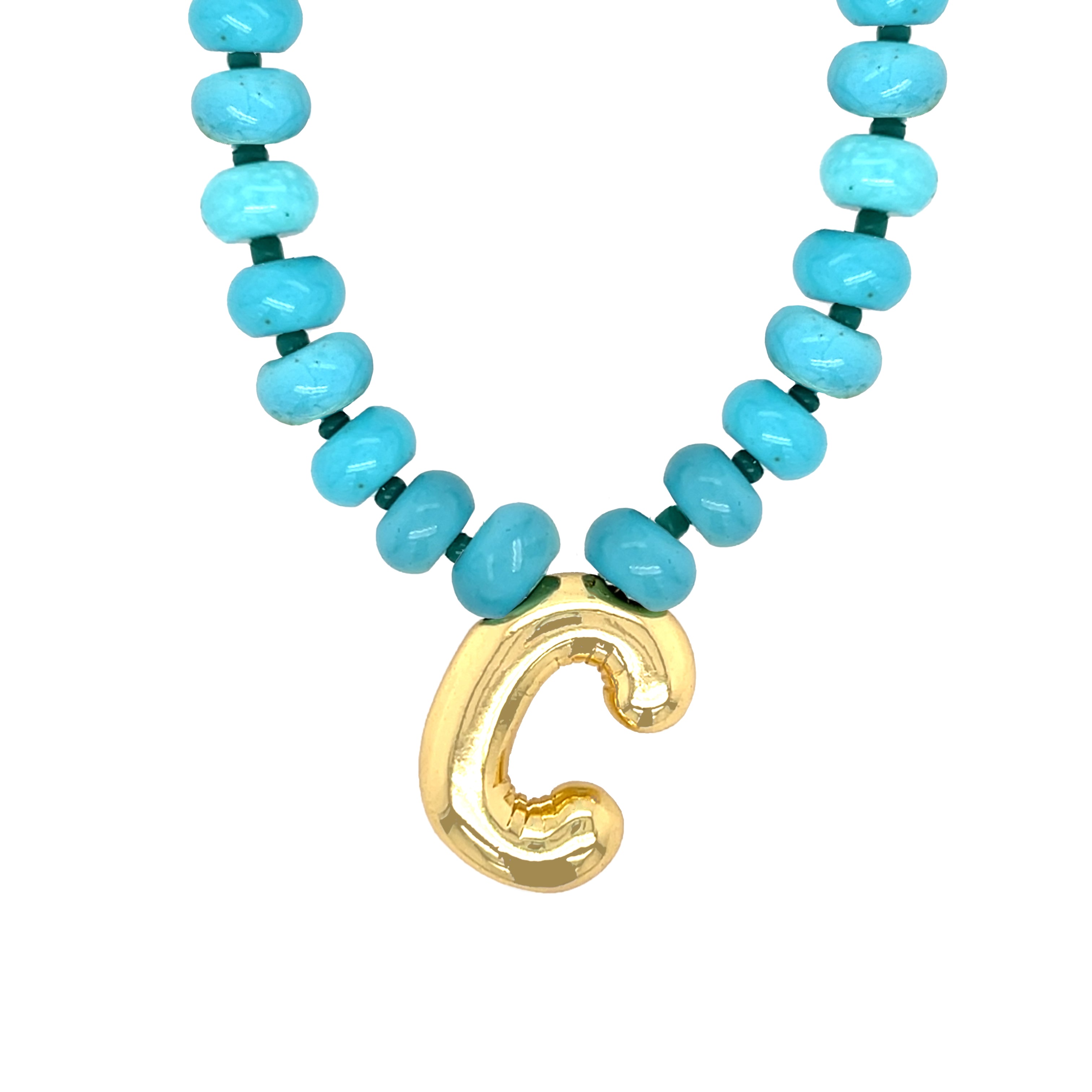 Necklace with turquoise beads and a gold letter 'C' pendant on a white background