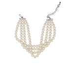 Pearl necklace with silver chain on a white background