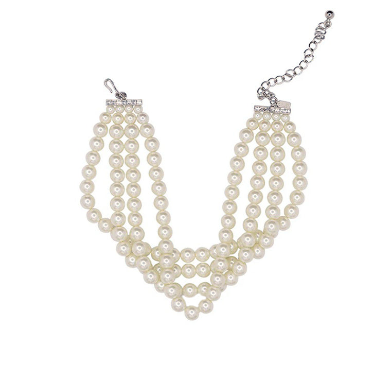 Pearl necklace with silver chain on a white background