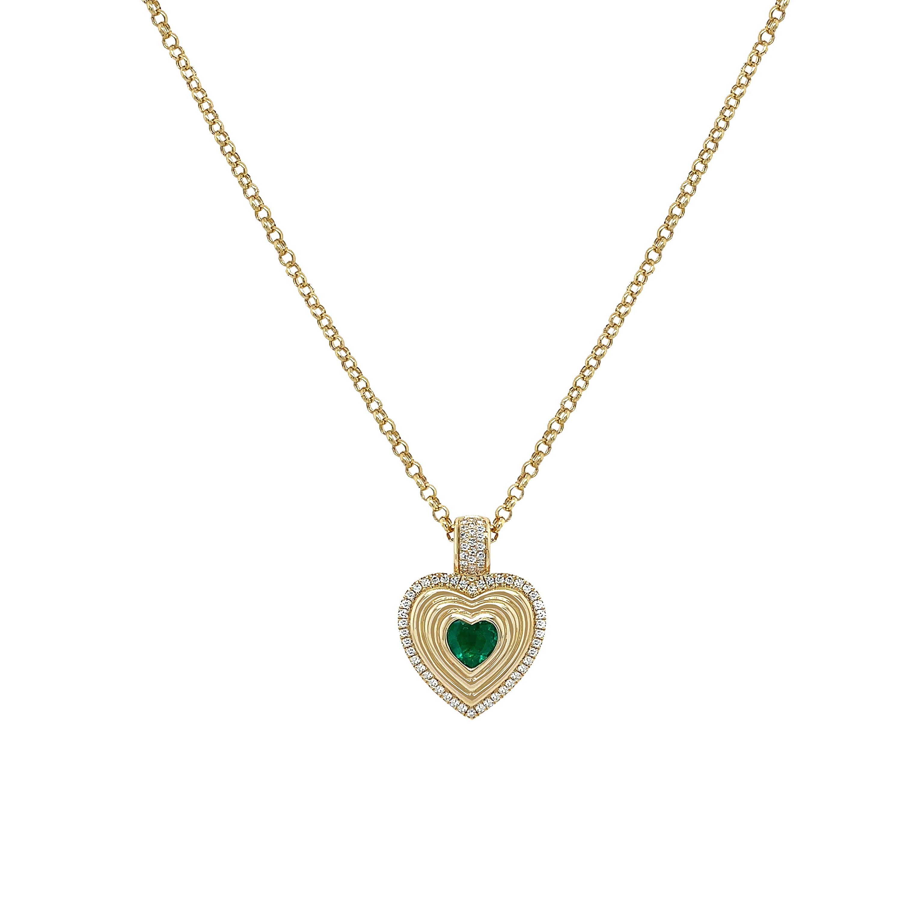 Diamond &amp; Emerald Heart Necklace

14K Yellow Gold
0.19 Diamond Carat Weight
0.41 Emerald Carat Weight
Heart: 0.82" Long x 0.59" Wide
16-18" Adjustable Length