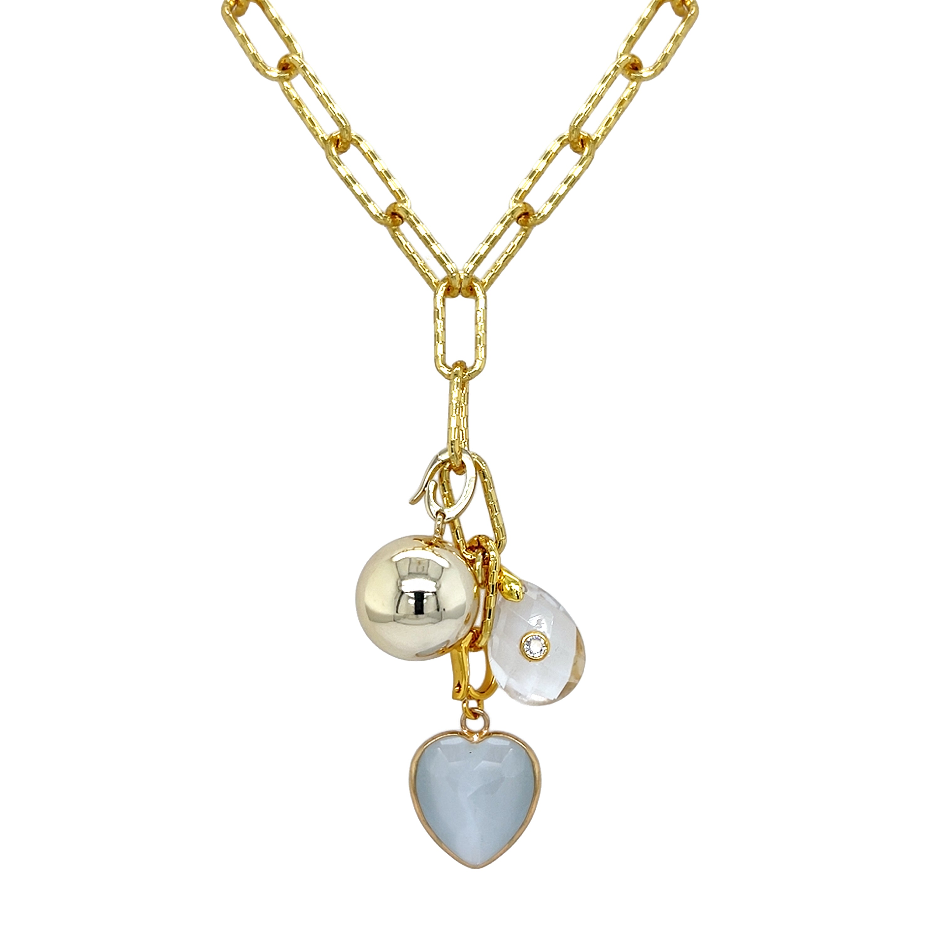 Gold necklace with heart-shaped pendant and round charm on a white background