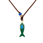 Resin Fish Pendant On Suede Leather Cord Necklace

This Fish Pendant Necklace is available in multiple color options, adding subtle yet eye-catching variety to your necklace collection. Perfect for layering, it complements diverse styles while being a chic statement.

Yellow Gold Filled
Fish Pendant: 1.5" Long X 0.5" Wide
Drop: 1.75" Long