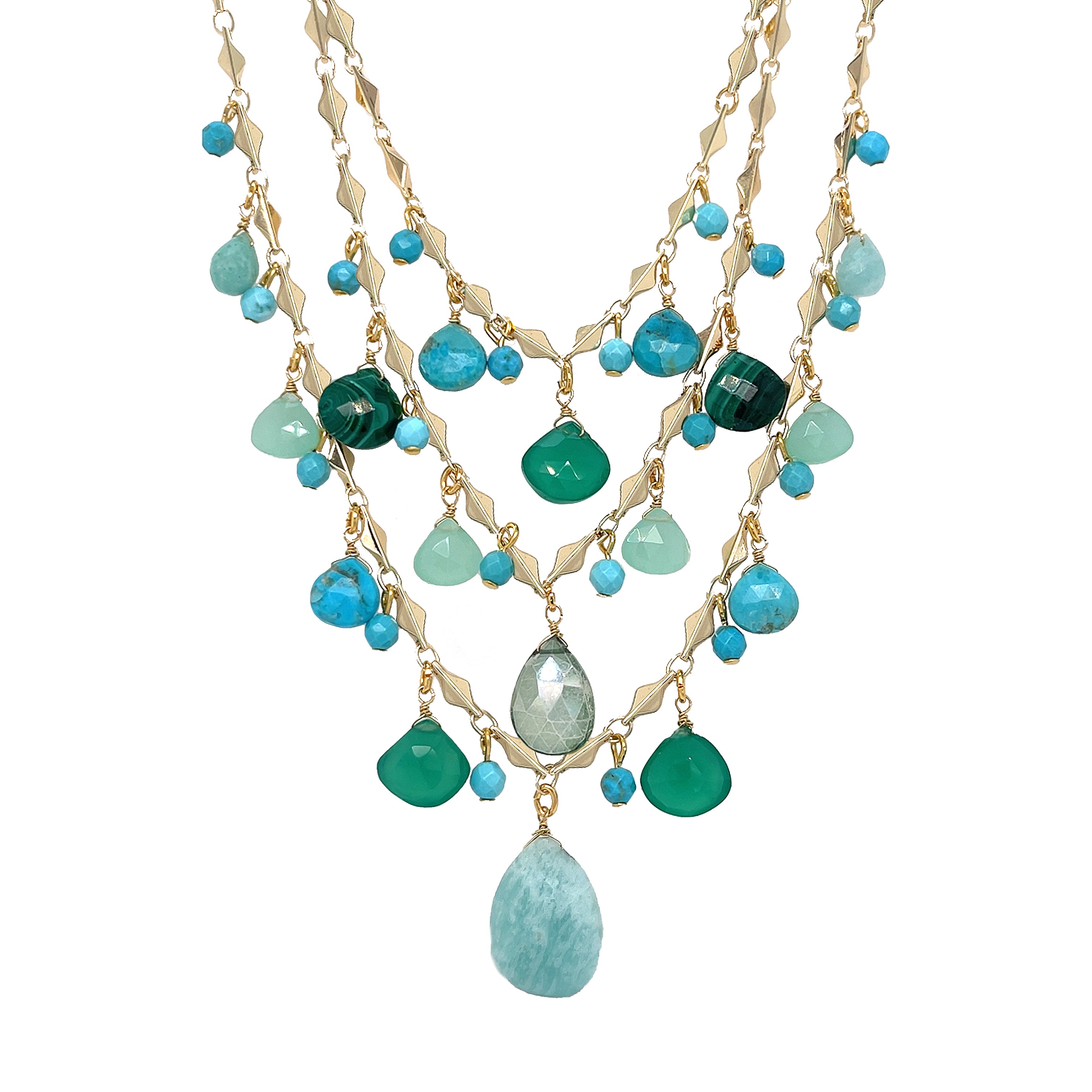 Malachite, Chalcedony &amp; Turquoise Multi Stone 3 Strand Necklace

Add a bold, vibrant touch to your look with our Blue Multi Stone Necklace. Perfect for making a statement and adding a pop of color to any outfit, this necklace will elevate your style game. Don't be afraid to stand out with this playful and eye-catching piece.

Yellow Gold Plated
16-18" Adjustable Length