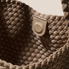 Cashmere Hobo Woven Bag

16" High X 12" Wide X 5” &nbsp;Deep
Strap Drop: 5"
Removable Pouch Included
Magnetic Snap Closure

Design by Naghedi