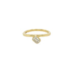 Gold ring with a diamond on a white background