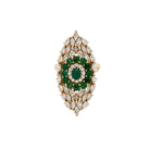 Diamond &amp; Emerald Eye Ring

A bold take on a protective symbol, our Diamond &amp; Emerald Eye Ring features an oval emerald center framed by a halo of round emeralds and mixed-shape diamonds. Marquise, pear, and round diamonds radiate outward in a striking eye-inspired design that catches light from every angle. Plus, the entire eye motif rotates smoothly in both directions adding playful movement and versatile styling options whether you wear it vertically or horizontally.
14K Yellow Gold
1.39" Long X 