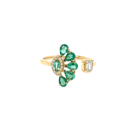 Emerald Cut Diamond & Pear Shaped Emerald Ring  14 Yellow Gold 0.10 Diamond Carat Weight 0.53 Emerald Carat Weight    For additional sizes, please contact our boutiques.