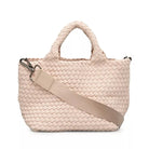 <p>Ecru&nbsp;Mini Woven Tote With Rolled Handles</p> <ul> <li>7.75" Height X 14.5" Length X 6.75" Depth</li> <li>Pouch Included</li> <li>Removable Crossbody Strap Included</li> </ul> <p><br></p> <p><em>Design by Naghedi</em></p>