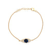 Blue Sapphire & Diamond Eye Bracelet  14K Yellow Gold 0.33 Blue Sapphire Carat Weight 0.77 Black & White Diamond Carat Weight Eye: 0.25" Long X 0.66" Wide 6-7" Adjustable Length