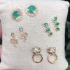 Emerald & Diamond Teardrop Crawler Pierced Earrings  14K Yellow Gold 0.20 Diamond Carat Weight 0.47 Emerald Carat Weight 0.55" Long X 0.25" Wide on display pillow