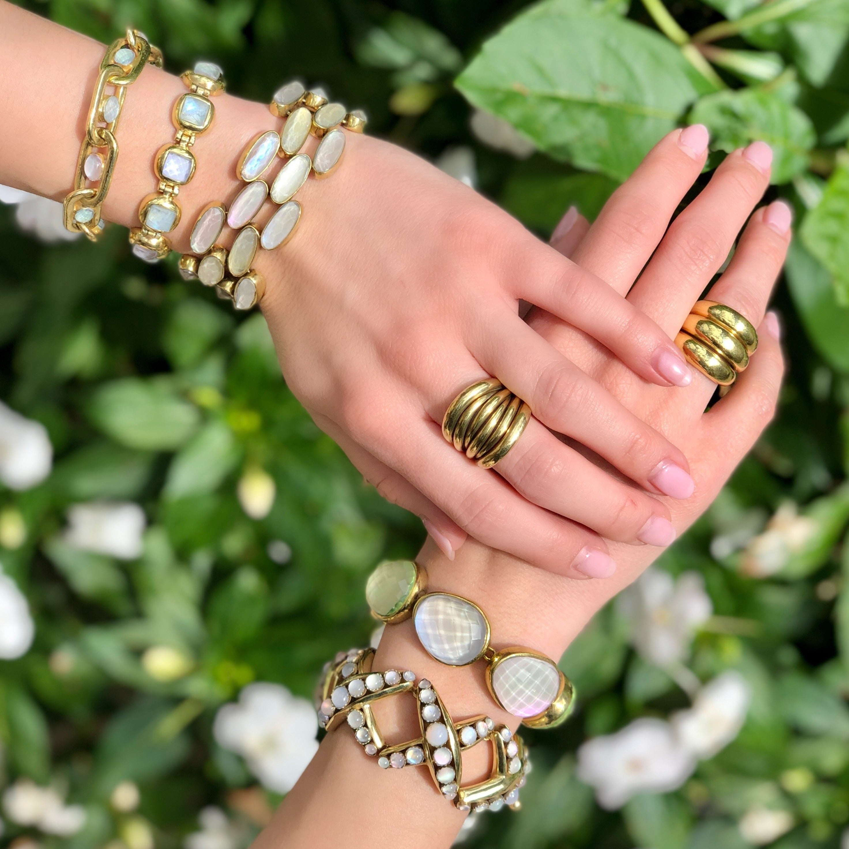 Triple band ring worn with chunky antique yellow gold bracelets