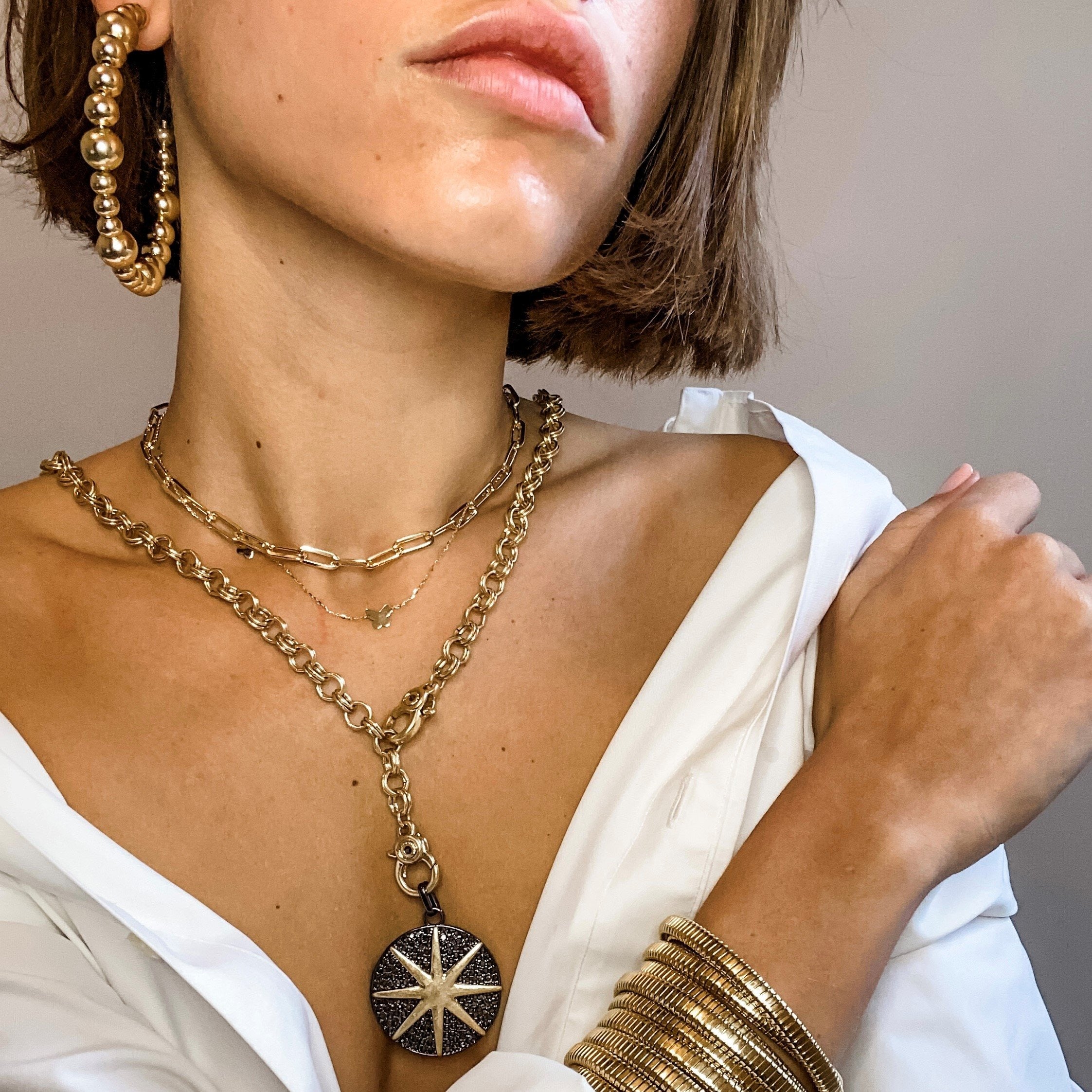 Starburst CZ Disc Two Tone Charm Necklace  Matte Yellow & Oxidized Gold Plated Chain: 36" Long Pendant: 1.5" Diameter