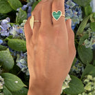 Malachite + diamond heart ring worn with large pave heart ring