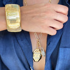 Wide Flat Cuff Bracelet  Yellow Gold Plated Over Silver Oval Shape: 2.22” X 1.76” 1.30” Width 0.50-0.75” Flexible Opening    As worn by Bevy Smith