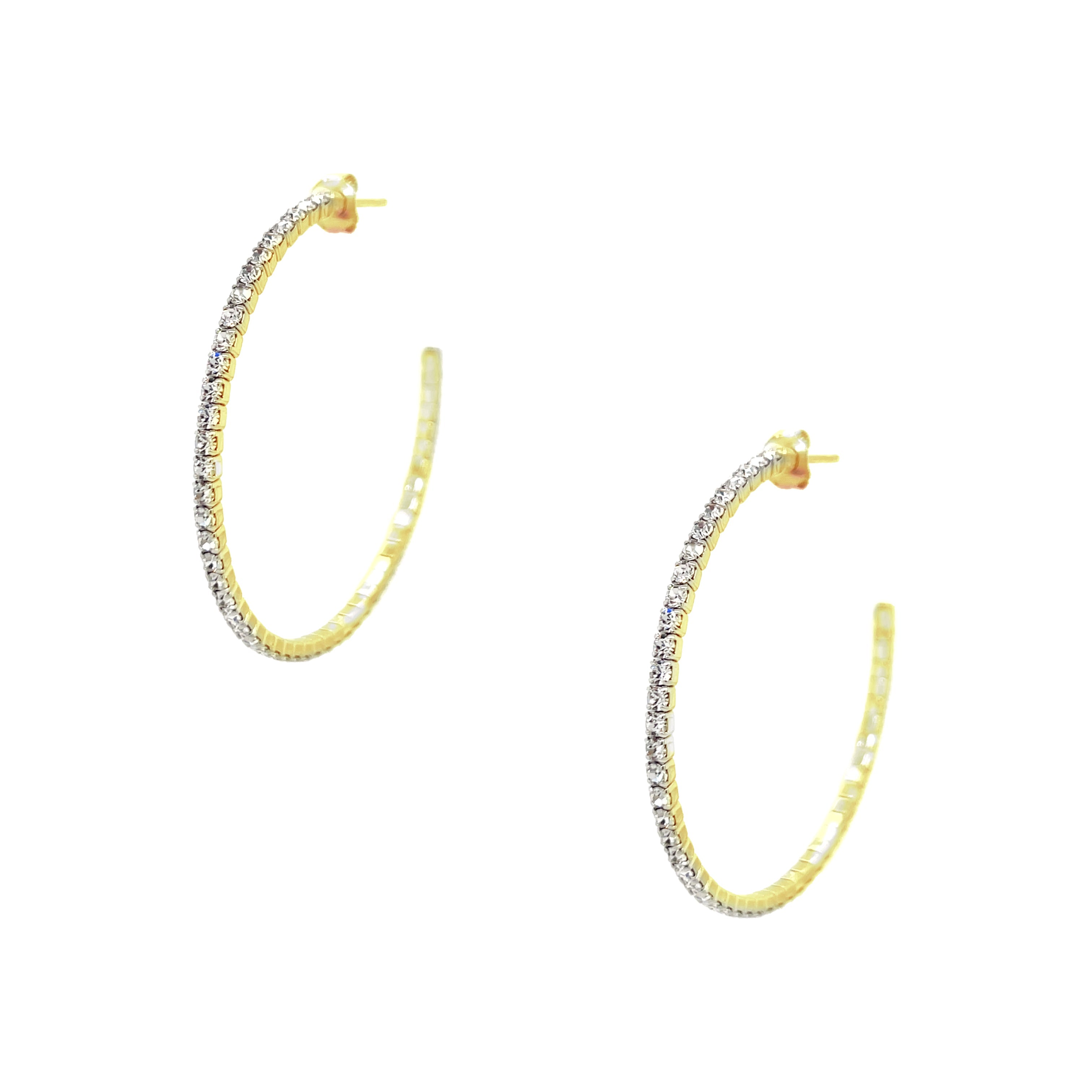  Flexible Pave Hoop Earrings  Our favorite sparkly hoop earrings!  The best part? They are flexible and lightweight, easy to wear all day long and into the night.   • Yellow Gold Plated  • Pave set Cubic Zirconia  • 1.5" Diameter