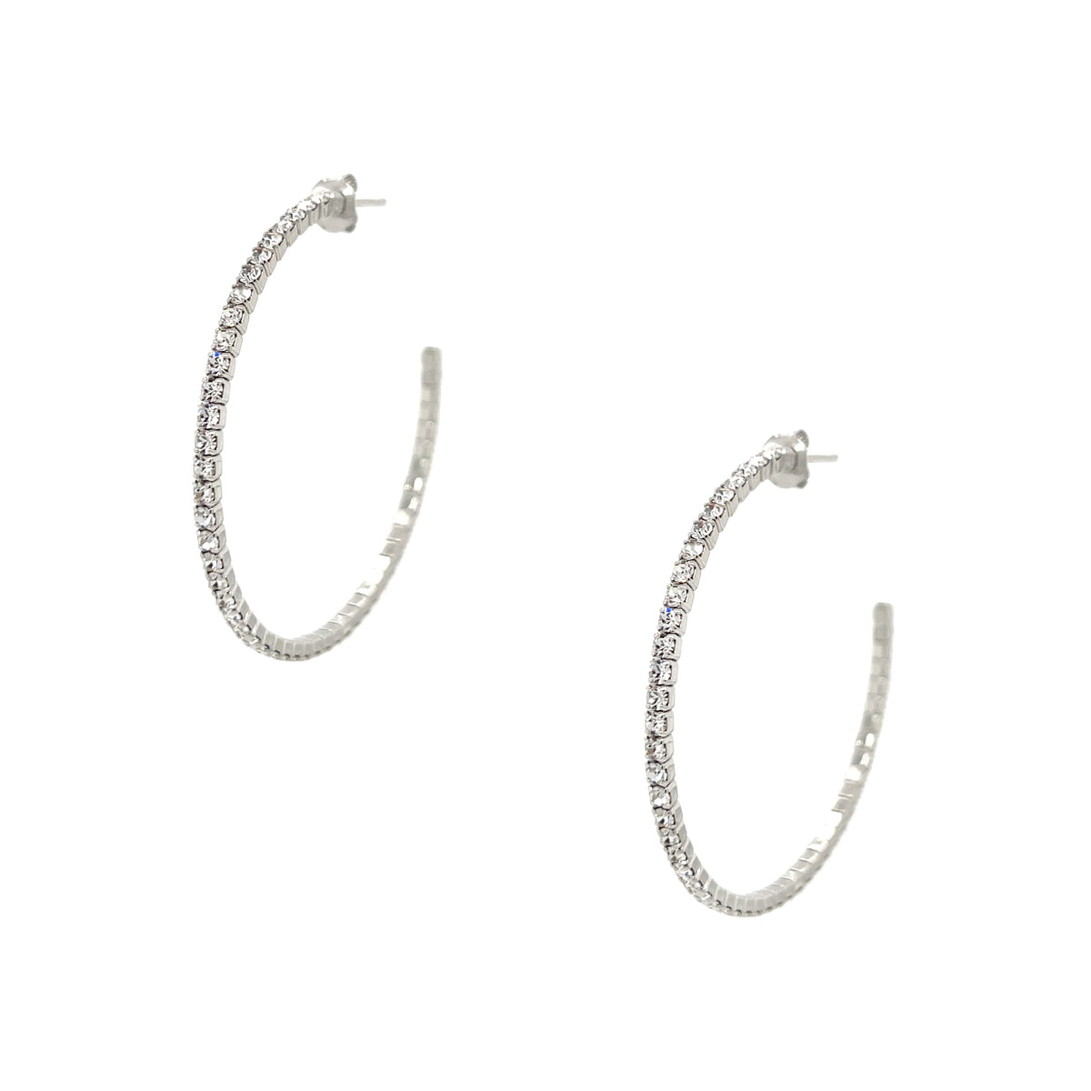 Flexible Pave Hoop Earrings  Our favorite sparkly hoop earrings!  The best part? They are flexible and lightweight, easy to wear all day long and into the night.   • White Gold Plated  • Pave set Cubic Zirconia  • 1.5" Diameter