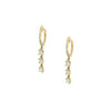 3 Diamond Drops on 14K Gold Pave Huggie Earrings  14K Yellow Gold 0.55 Diamond Carat Weight 0.95" Length X 0.10" Width Pierced