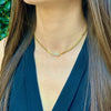 Pave love necklace displayed on woman's neck