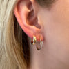 14K Gold & Pave Diamond Bypass Small Hoop Earrings 14K Yellow Gold 0.10 Diamond Carat Weight 0.76” Diameter 0.14” Width Pierced