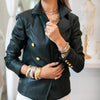 Model wearing Black Vegan Leather Jacket with Gold Button Detail