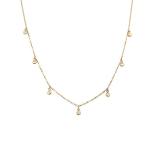 14K Gold Diamond Bezel Drops Chain Necklace  14K Yellow Gold 0.14 Diamond Carat Weight Chain: 16-18" Length Bezel: 0.10" Diameter