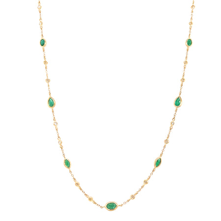Diamond & Emerald Bezel Station Necklace   14K Yellow Gold  0.20 Diamond Carat Weight  1.10 Emerald Carat Weight Chain: 15-17" Length  Design: 9.25" Length 