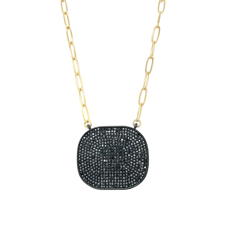 Pave Black CZ Plate Pendant Statement Link Chain Necklace  The black CZ stones on the pendant are set in a pave style, creating a unique look that exudes confidence and style. The pendant hangs gracefully from the link chain, adding a touch of sophistication to your look. Make a bold statement with this edgy and chic pendant necklace!  Yellow Gold Plated 1.32" Long X 1.52" Wide 16.5" Long view 1