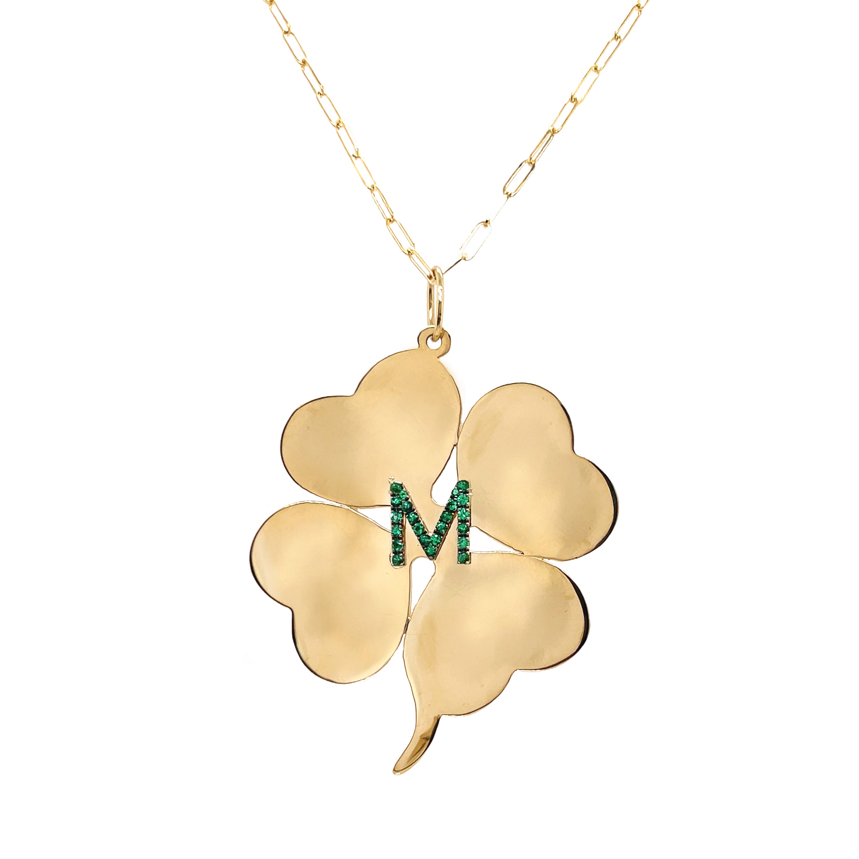 Pave Emerald Letter Large Clover Chain Necklace  14K Yellow Gold Emerald Carat Weight depends on the letter Chain: 30" Length Clover: 2.15" Length X 1.83" Width Letter: 0.40" Length X 0.40" Width