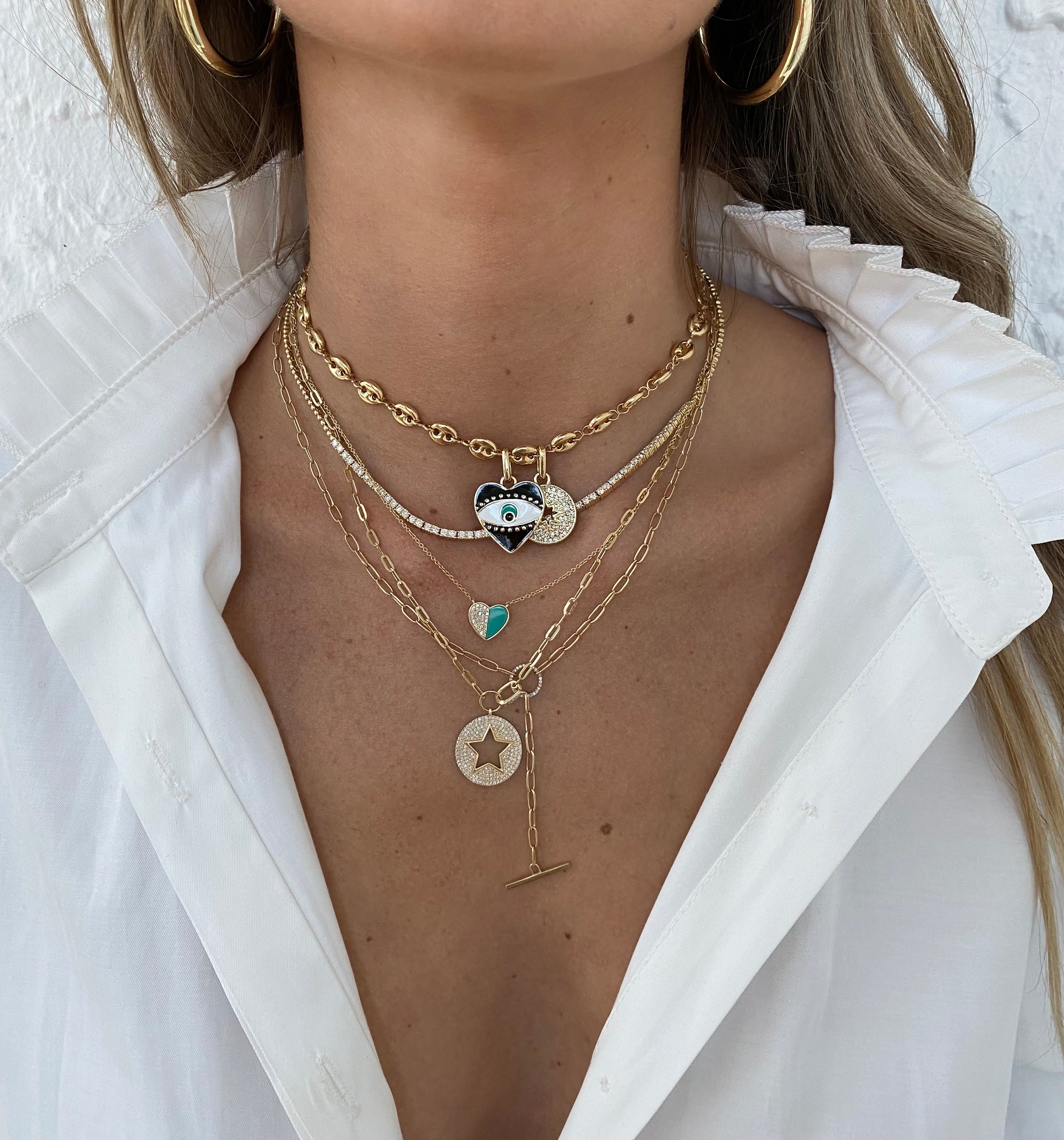 Half Turquoise & Half Pave Diamond Heart Chain Necklace  14K Yellow Gold 5.0 Turquoise Carat Weight 0.12 Diamond Carat Weight Heart: 0.40" High X 0.44" Wide Chain: 16-18" Length