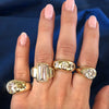 Gypsy ring collection displayed on woman's hand
