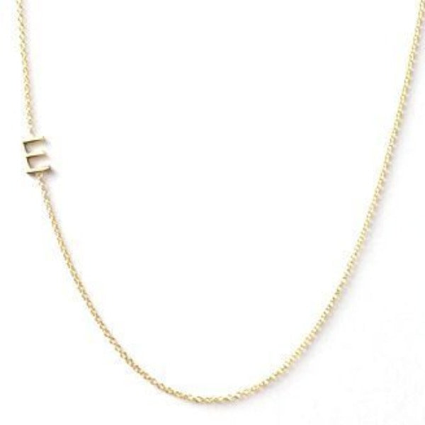 Asymmetric Mini Initial Necklace  14K Yellow Gold Chain: 16" Long Letter: 0.19" Diameter Please allow up to 3 weeks for delivery.