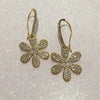 Yellow Gold Plated Pave Faux Diamond Daisy Drop Earrings • 1 3/4" L x 1"   • Pictured against glitter background