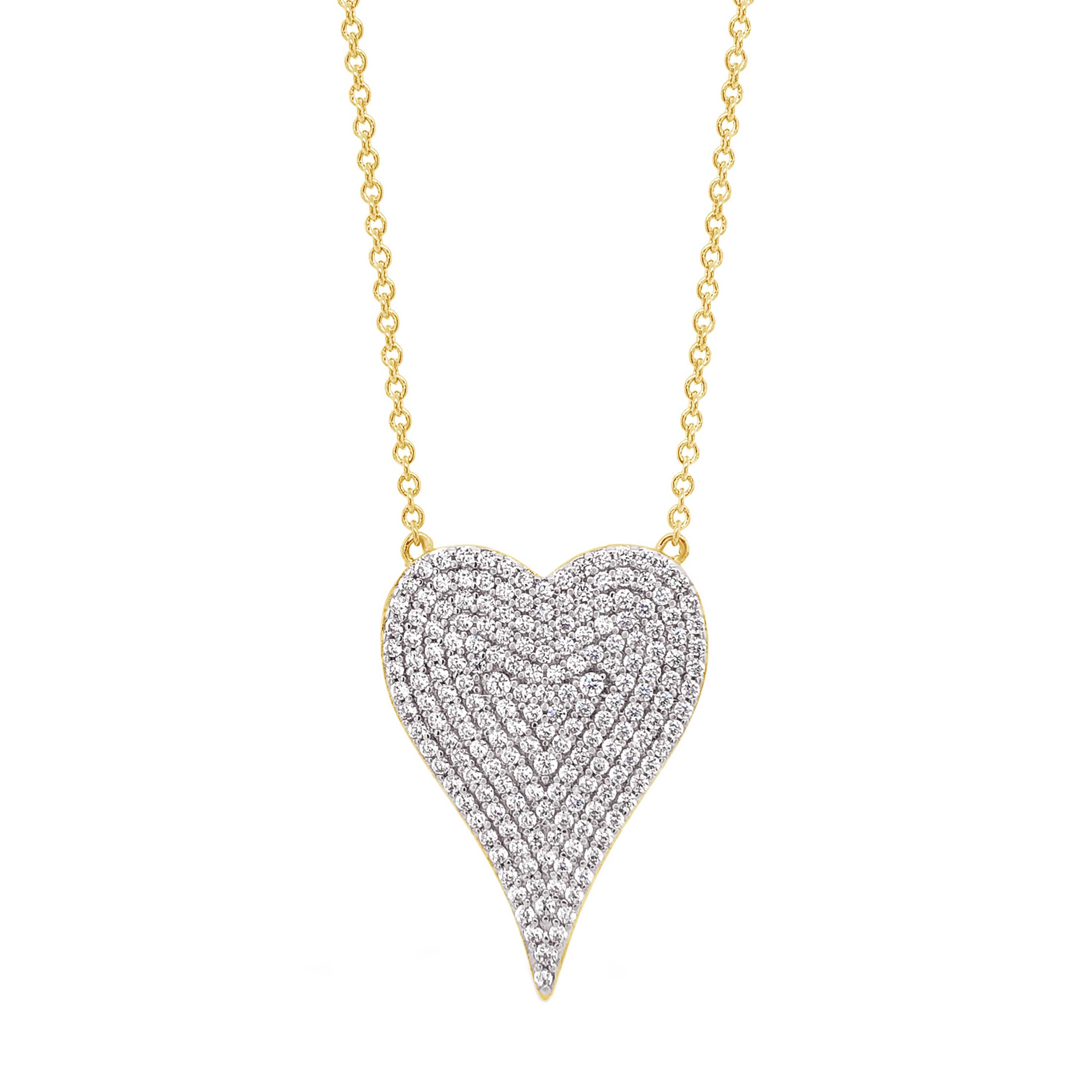 Pave CZ Heart Necklace  Yellow Gold Plated Chain The front of the heart is white gold plated Heart is 1.00" L x 0.70" W Chain Length is adjustable